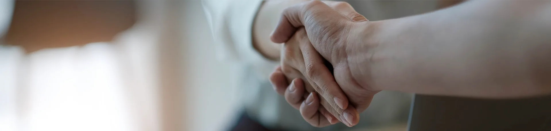 Choosing a Commercial Moving Company | Oler Relo Moving Close-up of a business handshake agreeing on a commercial moving company