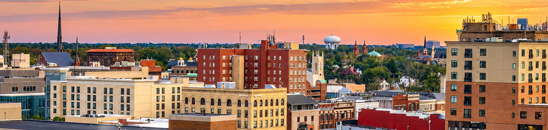 Out-of-State Moving Destinations | Oler Relo Moving A city skyline at sunset, representing a destination for an Oler Relo Moving out-of-state move